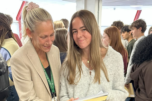 Chiswick School Headteacher Laura Ellener with a student 