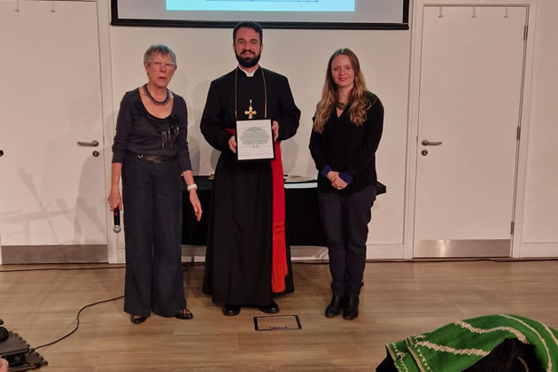 A representative of St Mary&rsquo;s Cathedral (centre) receives a Commended certificate
