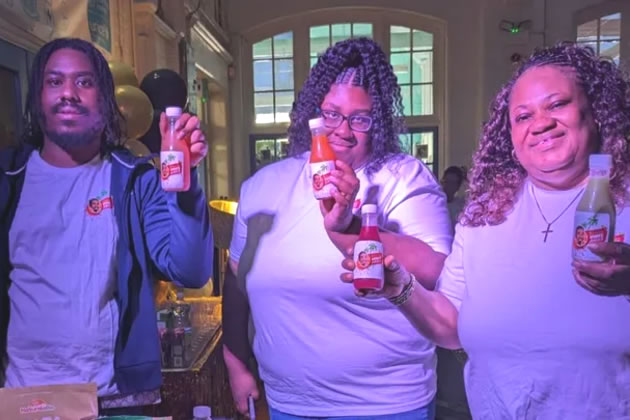 Elaisha and her two eldest children, supporting St Ann’s School leavers prom, with her juice bar