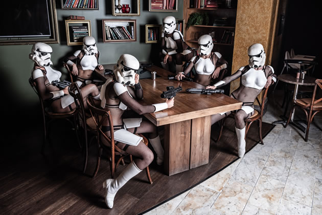 Imperial stormtroopers relax in a board room