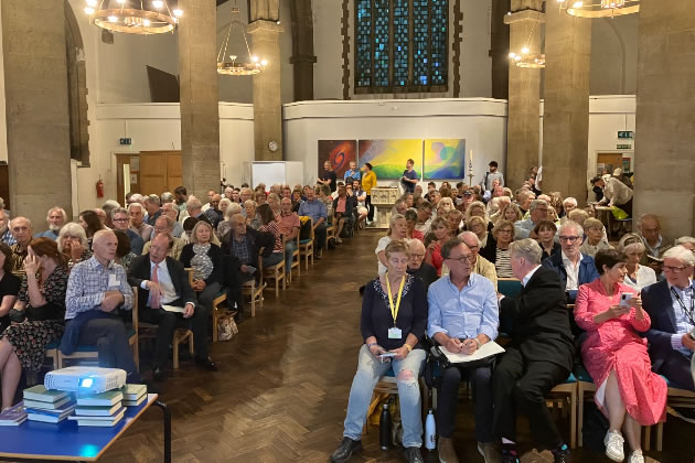 The crowded church during the meeting 