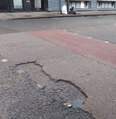 Kingston Road pothole in Wimbledon